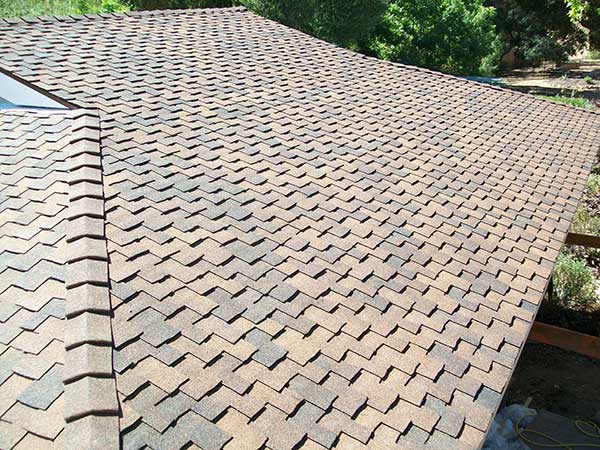 new architectural asphalt roof shingle installation